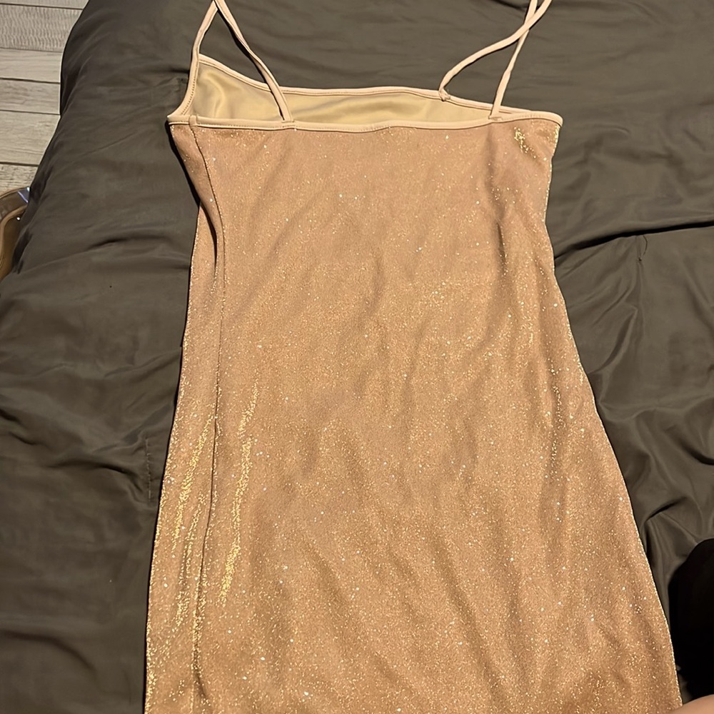 Much sparkly in person. Going out dress